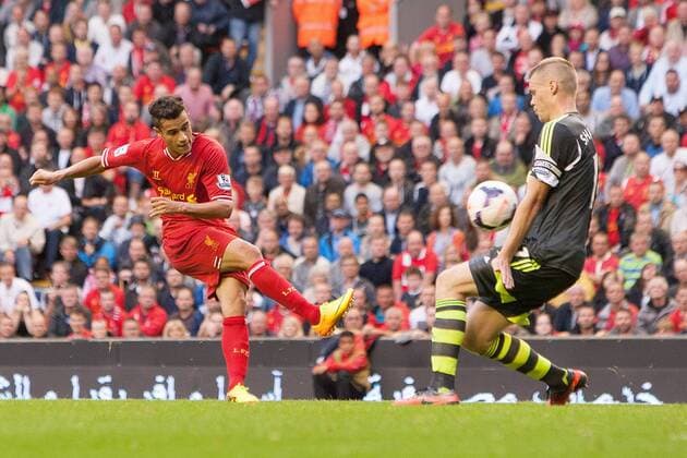 Stoke s Ryan Shawcross stops a strike at goal from Philippe Coutinho of Liverpool - FC Liverpool vs. Stoke City FC - Premier League - Anfield - Liverpool - 17 08 2013 EDITORIAL USE ONLY. No use with unauthorised audio, video, data, fixture lists, club league logos or live services. Online in-match use limited to 120 images, no video emulation. No use in betting, games or single club league player publications.