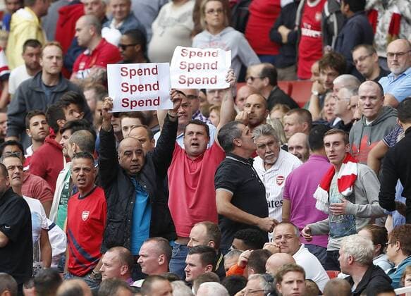 Arsenal s fans urge Arsene Wenger to spend money - FC Arsenal London - Barclays Premiership - Emirates Stadium - London - England -17 08 2013 - EDITORIAL USE ONLY. No use with unauthorised audio, video, data, fixture lists, club league logos or live services. Online in-match use limited to 120 images, no video emulation. No use in betting, games or single club league player publications.