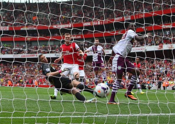 Arsenal FC London v Aston Villa . . London, UK . . 17.08.2013 Christian Benteke (AV) has his penalty kick saved by Wojciech Szczesny(A) but scored the goal on the rebound. 1-1 