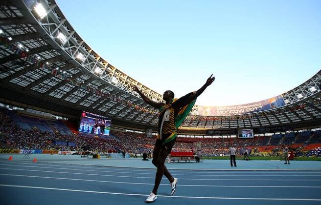 Usain Bolt of Jamaica celebrates after the Men s 200m Final of the 14th IAAF World Athletics Championships Moscow 2013 at Luzhniki Stadium in Moscow, Russia on Aug. 17, 2013. Usain Bolt claimed the title with 19.66 seconds. (Xinhua Li Ming) (SP)RUSSIA-MOSCOW-ATHLETICS-IAAF WORLD CHAMPIONSHIPS 