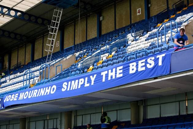 A man puts out a banner in favour of Jose Mourinho - Chelsea - Premier League - Stamford Bridge - London - 18th August 2013 - Pic Charlie Forgham-Bailey Sportimage EDITORIAL USE ONLY. No use with unauthorised audio, video, data, fixture lists, club league logos or live services. Online in-match use limited to 120 images, no video emulation. No use in betting, games or single club league player publications.