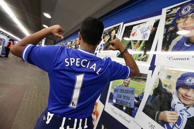 Special One - A young man wearing a shirt supporting Jose Mourinho - Chelsea - Premier League - Stamford Bridge - London - 18th August 2013 - Pic Charlie Forgham-Bailey Sportimage EDITORIAL USE ONLY. No use with unauthorised audio, video, data, fixture lists, club league logos or live services. Online in-match use limited to 120 images, no video emulation. No use in betting, games or single club league player publications.