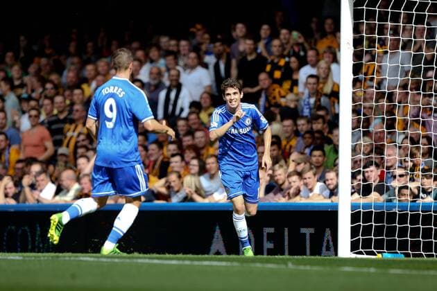 Oscar of Chelsea scoring his team s 1st goal - Chelsea v Hull City - Premier League - Stamford Bridge - London - 18th August 2013 - Pic Charlie Forgham-Bailey Sportimage EDITORIAL USE ONLY. No use with unauthorised audio, video, data, fixture lists, club league logos or live services. Online in-match use limited to 120 images, no video emulation. No use in betting, games or single club league player publications.