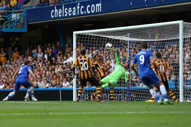 Branislav Ivanovic of Chelsea comes close to scoring but is denied by an acrobatic Allan McGregor goalkeeper of Hull City - Chelsea v Hull City - Premier League - Stamford Bridge - London - 18th August 2013 - Pic Charlie Forgham-Bailey Sportimage EDITORIAL USE ONLY. No use with unauthorised audio, video, data, fixture lists, club league logos or live services. Online in-match use limited to 120 images, no video emulation. No use in betting, games or single club league player publications.
