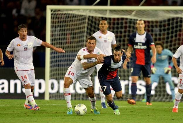 Javier Pastore (psg) - Adrian Mutu (aja) FOOTBALL : Paris SG vs Ajaccio - Ligue 1 - 18 08 2013 AnthonyBIBARD FEP Panoramic 
