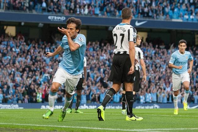David Silva of Manchester City celebrates his opening goal - Manchester City vs. Newcastle United - Premier League - Etihad Stadium - Manchester - 19 08 2013 Pic Philip Oldham Sportimage EDITORIAL USE ONLY. No use with unauthorised audio, video, data, fixture lists, club league logos or live services. Online in-match use limited to 120 images, no video emulation. No use in betting, games or single club league player publications.