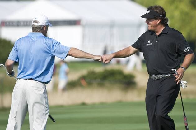 Aug. 21, 2013 - Jersey City, New Jersey, U.S - August 21, 2013: Phil Mickelson (USA) fist pumps his partner after a great shot during The Barclays Fed Ex Pro-Am at Liberty National Golf Course in Jersey City, NJ. Kostas Lymperopoulos csm GOLF 2013: The Barclays Fed Ex Championship AUG 21 - ZUMAc04