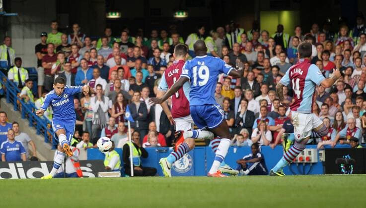 Chelsea s Eden Hazard fires in a shot off Aston Villa s Antonio Luna to put his side 1-0 up Chelsea v Aston Villa - Barclays Premiership - Stamford Bridge - London - England -21 08 2013 - Pic David Klein Sportimage EDITORIAL USE ONLY. No use with unauthorised audio, video, data, fixture lists, club league logos or live services. Online in-match use limited to 120 images, no video emulation. No use in betting, games or single club league player publications.