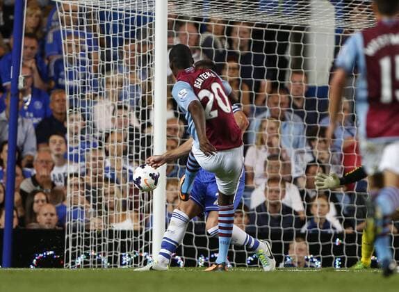 Aston Villa s Christian Benteke scoring his sides opening goal Chelsea v Aston Villa - Barclays Premiership - Stamford Bridge - London - England -21 08 2013 - Pic David Klein Sportimage EDITORIAL USE ONLY. No use with unauthorised audio, video, data, fixture lists, club league logos or live services. Online in-match use limited to 120 images, no video emulation. No use in betting, games or single club league player publications.