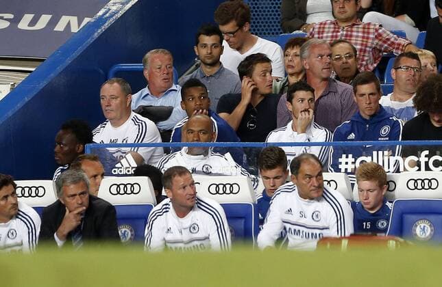 Chelsea s Fernando Torres dropped from the squad watches the match behind Jose Mourinho Chelsea FC London v Aston Villa - Barclays Premiership - Stamford Bridge - London - England -21 08 2013 - Pic David Klein Sportimage EDITORIAL USE ONLY. No use with unauthorised audio, video, data, fixture lists, club league logos or live services. Online in-match use limited to 120 images, no video emulation. No use in betting, games or single club league player publications.