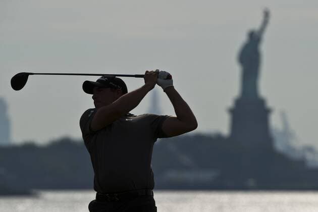 Aug. 23, 2013 - Jersey City, New Jersey, U.S - August 23, 2013: Martin Laird (SCO) drives off the 15th tee with the Statue of Liberty in the back ground during the continuation of the first round of The Barclays Fed Ex Championship at Liberty National Golf Course in Jersey City, NJ. Kostas Lymperopoulos csm GOLF 2013: The Barclays Fed Ex Championship AUG 23 - ZUMAc04