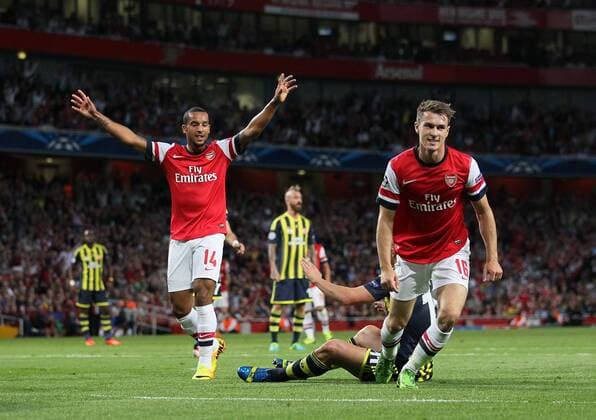 Arsenal s Aaron Ramsey celebrates scoring his sides opening goal Arsenal FC London v Fenerbahce istanbul - UEFA Champions League - Play-off Second Leg - Emirates Stadium - London - England -27 08 2013 - EDITORIAL USE ONLY. No use with unauthorised audio, video, data, fixture lists, club league logos or live services. Online in-match use limited to 120 images, no video emulation. No use in betting, games or single club league player publications.