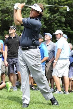 Aug. 30, 2013 - Norton, Massachusetts, USA - August 30, 2013 - Norton, Massachusetts, U.S. - Phil Mickelson plays the 9th hole during the first round of the Deutsche Bank Championship, FedEx Cup playoffs held at the Tournament Players Club in Norton Massachusetts. Mickelson finished the day 8 under with a 63. Eric Canha CSM PGA Golf Herren 2013: Deutsche Bank Championship Round 1 AUG 30 - ZUMAc04
