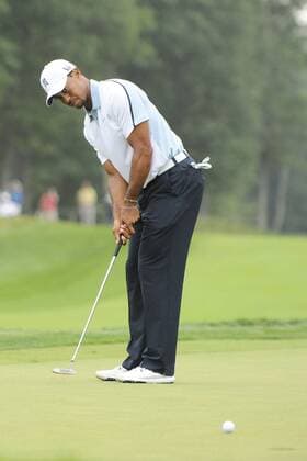 Aug. 31, 2013 - Norton, Massachusetts, USA - August 31, 2013 - Norton, Massachusetts, U.S. - Tiger Woods putts on the 15th green during the second round of the Deutsche Bank Championship, FedEx Cup playoffs held at the Tournament Players Club in Norton Massachusetts. Eric Canha CSM PGA Golf Herren 2013: Deutsche Bank Championship Round 2 AUG 31 - ZUMAc04