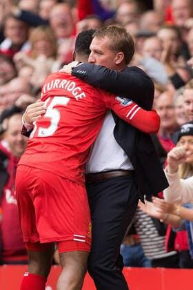 Manager of Liverpool, Brendan Rodgers congratulates opening goal scorer Daniel Sturridge - Liverpool vs. Manchester United - Barclay s Premier League - Anfield - Liverpool - 01 09 2013 Pic Philip Oldham Sportimage EDITORIAL USE ONLY. No use with unauthorised audio, video, data, fixture lists, club league logos or live services. Online in-match use limited to 120 images, no video emulation. No use in betting, games or single club league player publications.