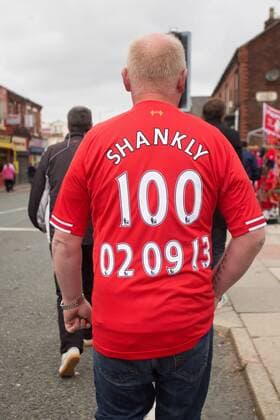 A fan wears a replica shirt commemorating Bill Shankly - FC Liverpool - Barclay s Premier League - Anfield - Liverpool - 01 09 2013 EDITORIAL USE ONLY. No use with unauthorised audio, video, data, fixture lists, club league logos or live services. Online in-match use limited to 120 images, no video emulation. No use in betting, games or single club league player publications.