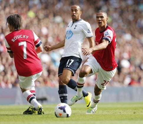 Arsenal s Kieron Gibbs tussles with Tottenham s Andros Townsend Arsenal v Tottenham Hotspur - Barclays Premier League - Emirates Stadium - London - England -01 09 2013 - Pic David Klein Sportimage EDITORIAL USE ONLY. No use with unauthorised audio, video, data, fixture lists, club league logos or live services. Online in-match use limited to 120 images, no video emulation. No use in betting, games or single club league player publications.