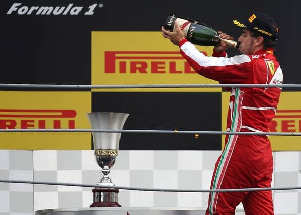 Fernando Alonso from Ferrari, celebrates the second place Monza Grand Prix Formula One Monza 08-09-2013 Foto Cezaro De Luca Insidefoto cezaroxdeluca