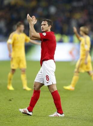 England s Frank Lampard applauds the fans at the final whistle Ukraine v England - 2014 World Cup Qualifier - Olympic Stadium - Kiev - Ukraine -10 09 2013 - Pic David Klein Sportimage EDITORIAL USE ONLY. No use with unauthorised audio, video, data, fixture lists, club league logos or live services. Online in-match use limited to 120 images, no video emulation. No use in betting, games or single club league player publications.