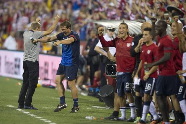 Sept. 10, 2013 - Columbus, Ohio, U.S - September 10, 2013: US Men s National Team head coach Jurgen Klinsmann and the bench erupt with pleasure after a penalty kick was called late in the game during the U.S. Men s National Team vs. Mexico National Team- World Cup Qualifier match at Columbus Crew Stadium - Columbus, OH. The United States Men s National Team defeated The Mexico National Team 2-0 and clinched a spot for the World Cup in Brazil. SOCCER 2013: US Men s National Team vs Mexico National Team SEP 10 - ZUMAc04