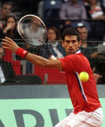 Novak Djokovic of Serbia returns the ball during their Davis Cup semifinal tennis match in Belgrade, Serbia, Sept. 13, 2013. (Xinhua BorislavxZdrinja) (SP)SERBIA-BELGRADE-TENNIS-DAVIS CUP 
