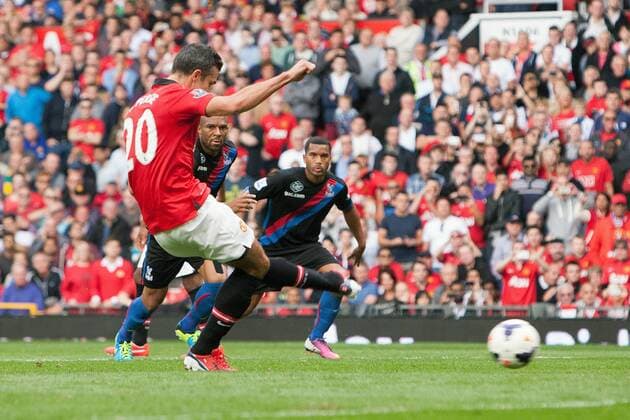 Robin van Persie of Manchester United opens the scoring from the penalty spot - Manchester United ManU vs. Crystal Palace - Premier League - Old Trafford - Manchester - 14 09 2013 EDITORIAL USE ONLY. No use with unauthorised audio, video, data, fixture lists, club league logos or live services. Online in-match use limited to 120 images, no video emulation. No use in betting, games or single club league player publications.