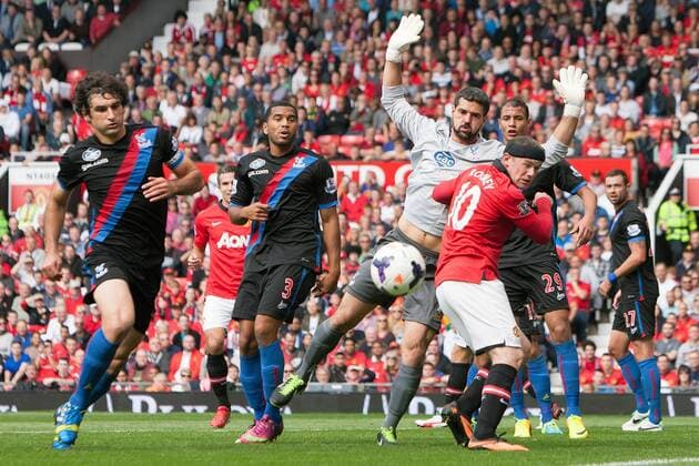 Wayne Rooney of Manchester United struggles to reach a headed chance - Manchester United ManU vs. Crystal Palace - Premier League - Old Trafford - Manchester - 14 09 2013 EDITORIAL USE ONLY. No use with unauthorised audio, video, data, fixture lists, club league logos or live services. Online in-match use limited to 120 images, no video emulation. No use in betting, games or single club league player publications.