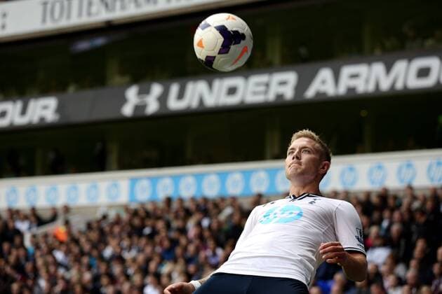Tottenham s Lewis Holtby chests the ball - Tottenham Hotspur vs Norwich City - Premier League 2013 14 - White Hart Lane - London - 14th September 2013 - EDITORIAL USE ONLY. No use with unauthorised audio, video, data, fixture lists, club league logos or live services. Online in-match use limited to 120 images, no video emulation. No use in betting, games or single club league player publications.