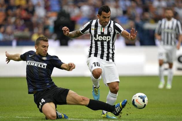 Hugo Campagnaro Inter, Carlos Tevez Juventus - Mailand 14-09-2013 Stadio Giuseppe Meazza, San Siro - Serie A Inter Mailand vs Juventus Turin andreaxstaccioli