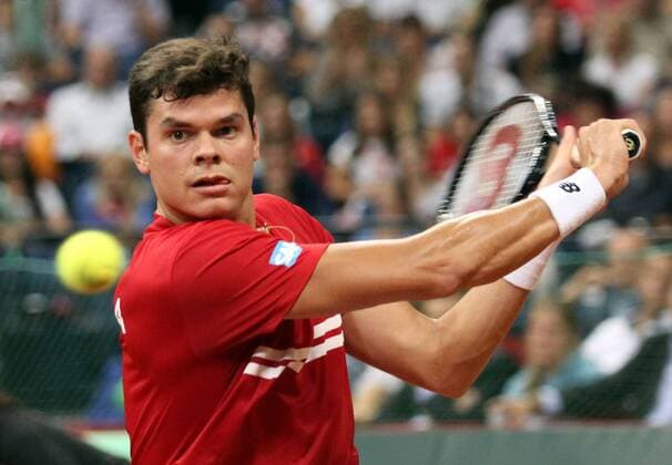 Canada s Milos Raonic returns a ball during the Davis Cup semifinals tennis match in Belgrade, Serbia, Sept. 15, 2013. (Xinhua BorislavZdrinja) (SP)SERBIA-BELGRADE-TENNIS-DAVIS CUP-SERBIA-CANADA 