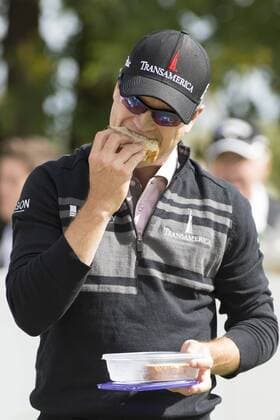 Sept. 16, 2013 - Lake Forest, IL, United States of America - Sept. 16, 2013: Lake Forest, Illinois, U.S. - Zach Johnson takes a snack break before the 10th hole during the fourth round of the BMW Championship, FedEx Cup playoffs held at the Conway Farms Golf Club in Lake Forest, Illinois. PGA Golf Herren 2013: BMW Championship SEP 16 - ZUMAc04