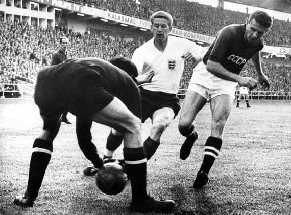 1958 World Cup England v Russia Russian goalkeeper Lev Yashin is charged by Kevan of England during the World Cup match in Gothenburg, Sweden. The match ended in a 2-2 draw. 9th June 1958.  UnitedArchives00563216