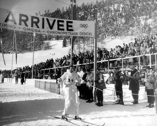 1948 Winter Olympics - Switzerland Nils Karlsson of Sweden as he arrives at the finishing line at the end of the Cross Country race at St Moritz. It was first thought that he was the winner, until it was later officially announced that the first place had been taken by his countryman Martin Lundstroem. 2nd February 1948, Olympia, Olympiade, Olympische Spiele  UnitedArchives00594903