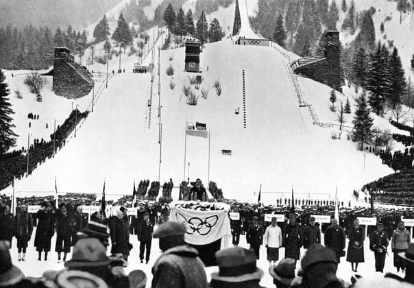 Dr. Karl Ritter von Halt, President of the Organisation for the IV Winter Olympics 1936 gives his inaugural address and welcome speech in the Olympic Ski Stadium to the teams of 28 nations. Â  UnitedArchives00797745