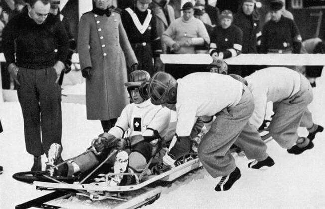 Reto Capadrutt Switzerland I record holder is pushed in the bobsleigh - silver in the 1932 and 1936 Games. Â  UnitedArchives00798015