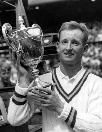 Rod Laver (AUS) shows off the men s singles championship trophy on the Centre Court - Wimbledon 7th July 1961 Â  UnitedArchives00929267