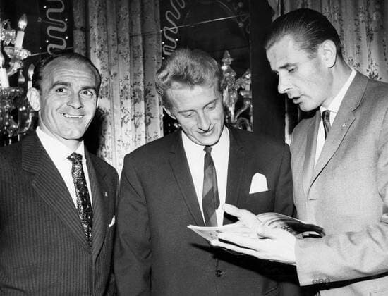 23rd October 1963: Dinner at the cafe Royale for World footballers. A dinner was held this evening for the World Footballer team at the Cafe Royale, after playing England, who won 2-1. Photo shows: Alfredo Di Stefano, Denis Law and Lev Yashin, the Russian goalkeeper, at the dinner this evening.  UnitedArchives01009919