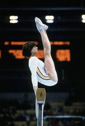 Nadia Comaneci from Romania during individual exercise at beam; she scored a perfect 10 - Moscow Olympic Games, 25 July 1980., Sport, Sportlerin, Rumänien, turnen, Turnerin, 1980er, 80er Jahre, Olympia, Olympiade, Olympische Spiele, Gymnastik, Turnen, Turner, Riege, Turnerin, Gymnast, Gymnastin  UnitedArchives01025851