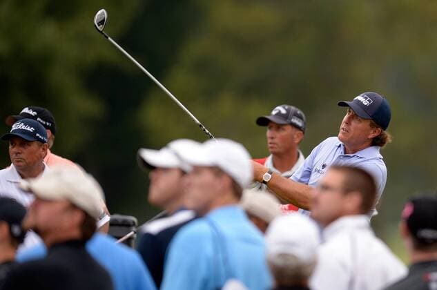 Phil Mickelson drives hole seven during the third round of the PGA Golf Herren Tour Championship on September 21, 2013 at East Lake Golf Club in Atlanta. Mickelson was 12 strokes behind leader Henrik Stenson when he made the turn at even par for the day.  AJP2013092107