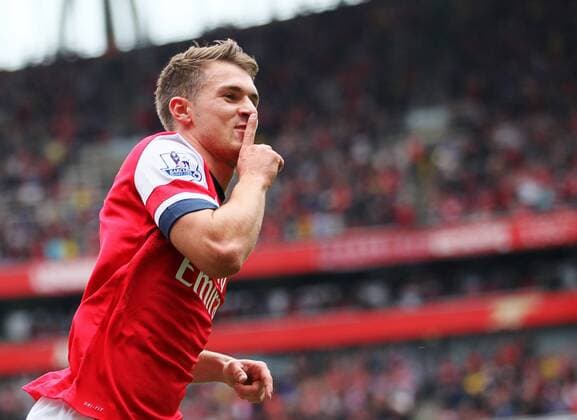Arsenal s Aaron Ramsey celebrates scoring his sides opening goal Arsenal v Stoke - Barclays Premier League- Emirates Stadium - London - England -22 09 2013 - EDITORIAL USE ONLY. No use with unauthorised audio, video, data, fixture lists, club league logos or live services. Online in-match use limited to 120 images, no video emulation. No use in betting, games or single club league player publications.