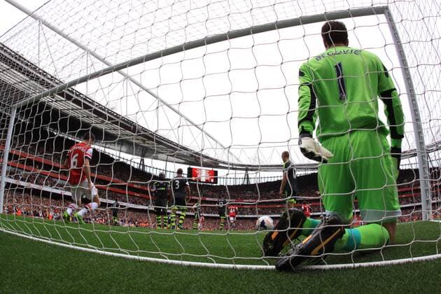 Arsenal v Stoke City . . London, UK . . 22.09.2013 Asmir Begovic (SC) in the back of the net after Per Mertesacker (A) scored the second Arsenal goal. 2-1 