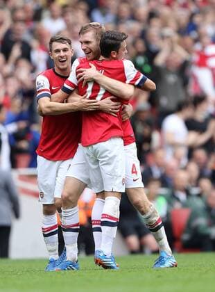 Arsenal s Per Mertesacker celebrates scoring his sides second goal Arsenal v Stoke - Barclays Premier League- Emirates Stadium - London - England -22 09 2013 - EDITORIAL USE ONLY. No use with unauthorised audio, video, data, fixture lists, club league logos or live services. Online in-match use limited to 120 images, no video emulation. No use in betting, games or single club league player publications.