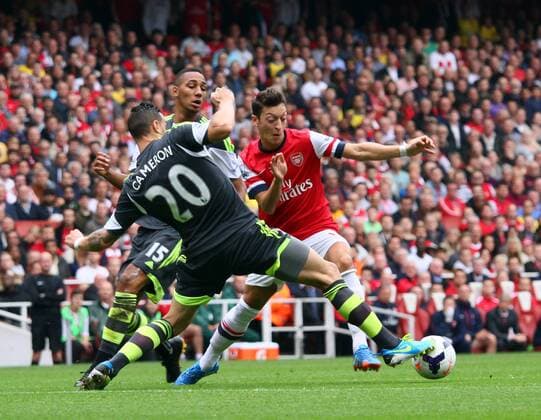 Arsenal v Stoke City . . London, UK . . 22.09.2013 Mesut Ozil (A) on the attack.