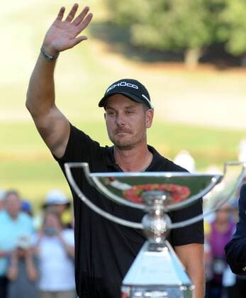Tournament winner Henrik Stenson waves during a ceremony on No. 18 after posting a 2-under 68, three strokes in front of second place finisher Jordan Spieth, at the PGA Golf Herren Tour Championship on September 22, 2013 at East Lake Golf Club in Atlanta. Stenson also won the FedEx Cup playoff for a $10 million payout bonus.  AJP2013092218