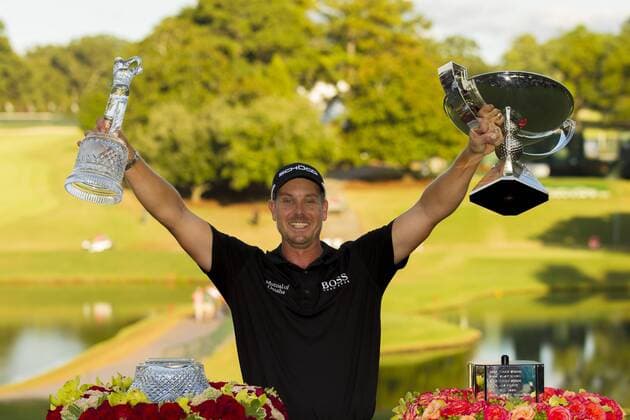 September 22, 2013: Henrik Stenson of Sweden holds the FedEx Cup and Tour Championship trophies after winning in the final round of the FedEx Cup - The Tour Championship at East Lake Golf Club in Atlanta, Georgia. GOLF: SEP 22 PGA Golf Herren - TOUR Championship by Coca-Cola - Final Round Icon20475648 EDITORIAL USE ONLY