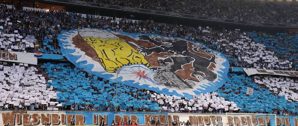 FUSSBALL DFB POKAL 1. RUNDE SAISON 2013 2014 TSV 1860 Muenchen - 24.09.2013 1860 Muenchen Fans mit einer Oktoberfest Fanchoreographie in der Nordkurve der Allianz Arena in Muenchen 