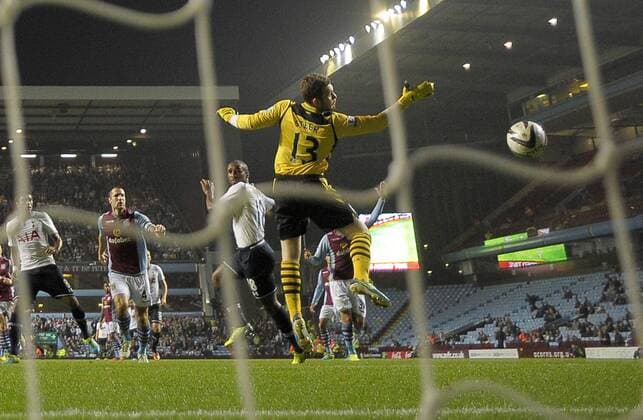 Jermaine Defoe scores the first goal of the game for Tottenham Hotspur - Football - Capital One Cup - Aston Villa vs Tottenham Hotspur - Villa Park Birmingham - Season 2013-2014 - September 24th 2013 - Photograph Malcolm Couzens Sportimage EDITORIAL USE ONLY. No use with unauthorised audio, video, data, fixture lists, club league logos or live services. Online in-match use limited to 120 images, no video emulation. No use in betting, games or single club league player publications.