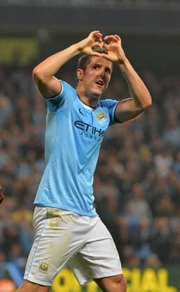 Stevan Jovetic of Manchester City celebrates his goal - Capital One Cup - Third Round - Manchester City vs Wigan Athletic - Etihad Stadium - Manchester - 24 09 13 - Picture Simon Bellis Sportimage EDITORIAL USE ONLY. No use with unauthorised audio, video, data, fixture lists, club league logos or live services. Online in-match use limited to 120 images, no video emulation. No use in betting, games or single club league player publications.