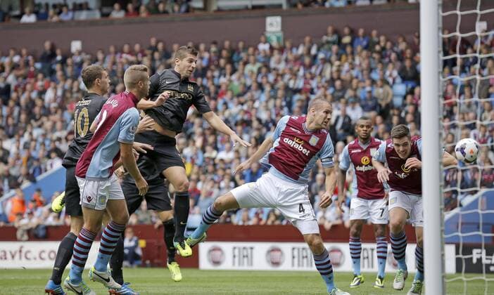 Matija Nastasic of Manchester City goes close with a header at goal - Football - Barclays Premier League - Aston Villa vs Manchester City - Villa Park Birmingham - Season 2013-2014 - September 28th 2013 - Photograph Malcolm Couzens Sportimage EDITORIAL USE ONLY. No use with unauthorised audio, video, data, fixture lists, club league logos or live services. Online in-match use limited to 120 images, no video emulation. No use in betting, games or single club league player publications.