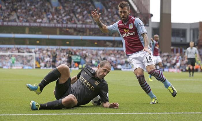 Pablo Zabaleta of Manchester City falls in the penalty area with Antonio Luna of Aston Vila close-by but fails to win a penalty - Football - Barclays Premier League - Aston Villa vs Manchester City - Villa Park Birmingham - Season 2013-2014 - September 28th 2013 - Photograph Malcolm Couzens Sportimage EDITORIAL USE ONLY. No use with unauthorised audio, video, data, fixture lists, club league logos or live services. Online in-match use limited to 120 images, no video emulation. No use in betting, games or single club league player publications.